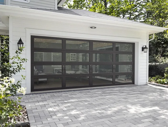 Simsbury Garage Door Repair design specialist presenting custom garage door options to Simsbury homeowner