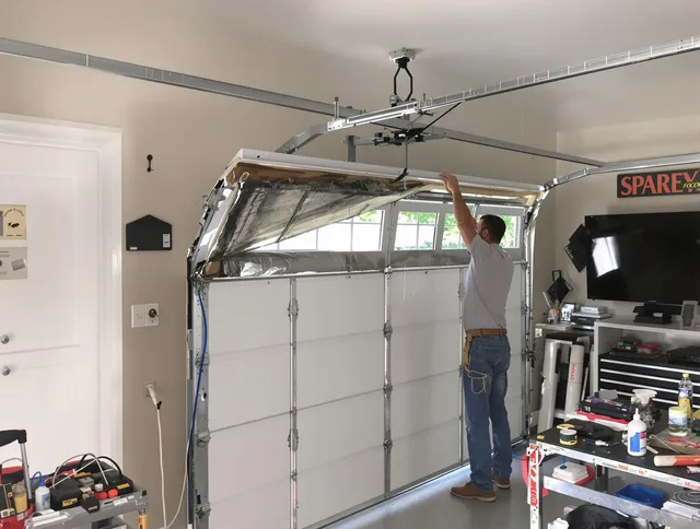 Garage door section replacement by Simsbury Garage Door Repair in Simsbury