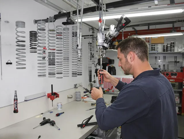 Simsbury Garage Door Repair safety certified technician performing precision spring replacement in Simsbury